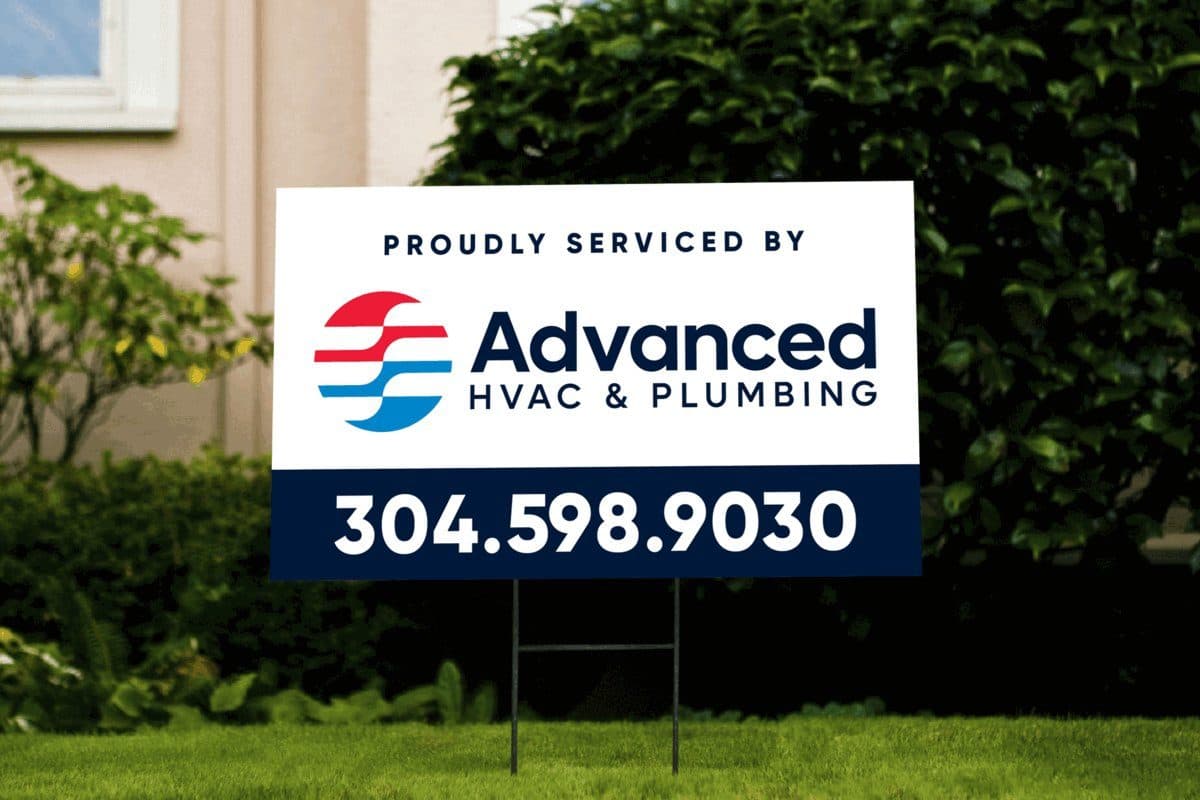 A lawn sign reading “Proudly serviced by Advanced HVAC & Plumbing” above the phone number 304.598.9030